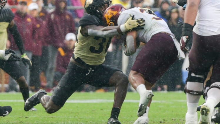 Purdue linebacker Jaylan Alexander (36) tackles Minnesota running back Trey Potts (3) during the third quarter of an NCAA college football game, Saturday, Oct. 2, 2021 at Ross-Ade Stadium in West Lafayette, Ind.Cfb Purdue Vs Minnesota