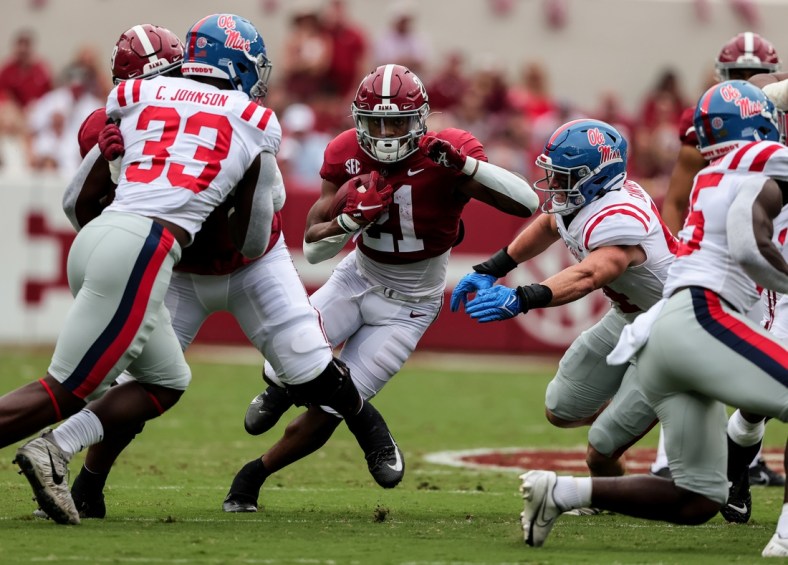 Oct 2, 2021; Tuscaloosa, Alabama, USA;  Alabama Crimson Tide running back Jase McClellan (21) carries the ball against the Mississippi Rebels during the first half of an NCAA college football game at Bryant-Denny Stadium. Mandatory Credit: Butch Dill-USA TODAY Sports