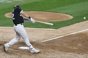 Oct 2, 2021; Chicago, Illinois, USA; Chicago White Sox first baseman Gavin Sheets (32) hits an RBI-single against the Detroit Tigers during the seventh inning at Guaranteed Rate Field. Mandatory Credit: Kamil Krzaczynski-USA TODAY Sports