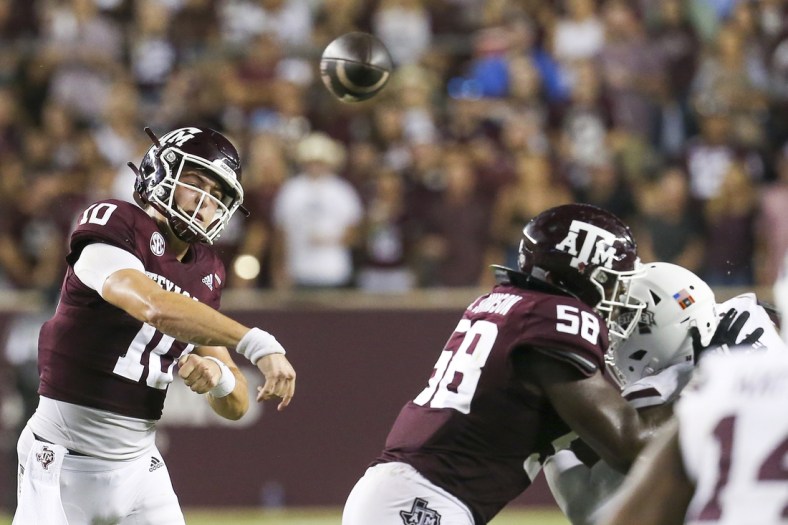 Oct 2, 2021; College Station, Texas, USA;  Texas A&M Aggies quarterback Zach Calzada (10) passes against the Mississippi State Bulldogs in the fourth quarter at Kyle Field. Mandatory Credit: Thomas Shea-USA TODAY Sports