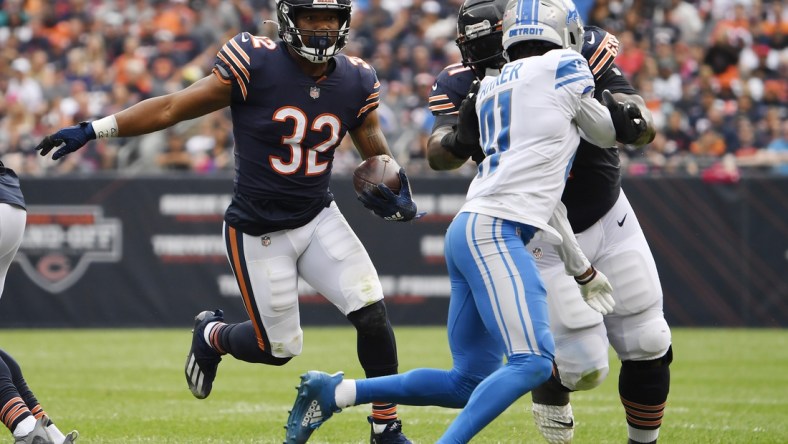 Oct 3, 2021; Chicago, Illinois, USA; Chicago Bears running back David Montgomery (32) runs with the football in the first half against the Detroit Lions at Soldier Field. Mandatory Credit: Quinn Harris-USA TODAY Sports