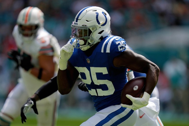 Oct 3, 2021; Miami Gardens, Florida, USA; Indianapolis Colts running back Marlon Mack (25) runs the ball against the Miami Dolphins during the first half at Hard Rock Stadium. Mandatory Credit: Jasen Vinlove-USA TODAY Sports