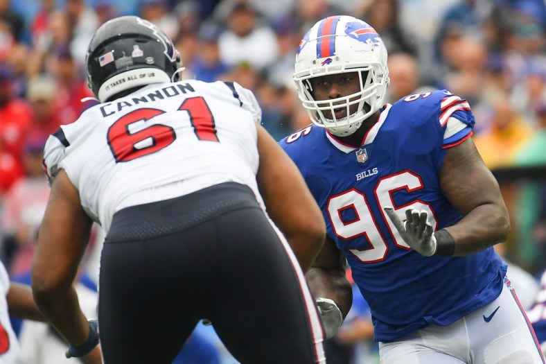 Oct 3, 2021; Orchard Park, New York, USA; Buffalo Bills defensive end Boogie Basham (96) pressures as Houston Texans offensive tackle Marcus Cannon (61) blocks during the first half at Highmark Stadium. Mandatory Credit: Rich Barnes-USA TODAY Sports