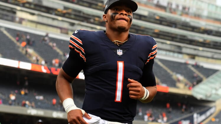 Oct 3, 2021; Chicago, Illinois, USA; Chicago Bears quarterback Justin Fields (1) leaves the field after the game against the Detroit Lions at Soldier Field. Mandatory Credit: Quinn Harris-USA TODAY Sports