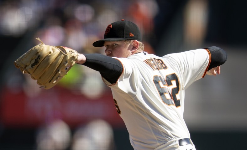 Oct 3, 2021; San Francisco, California, USA; San Francisco Giants starting pitcher Logan Webb (62) delivers against the San Diego Padres during the first inning at Oracle Park. Mandatory Credit: D. Ross Cameron-USA TODAY Sports