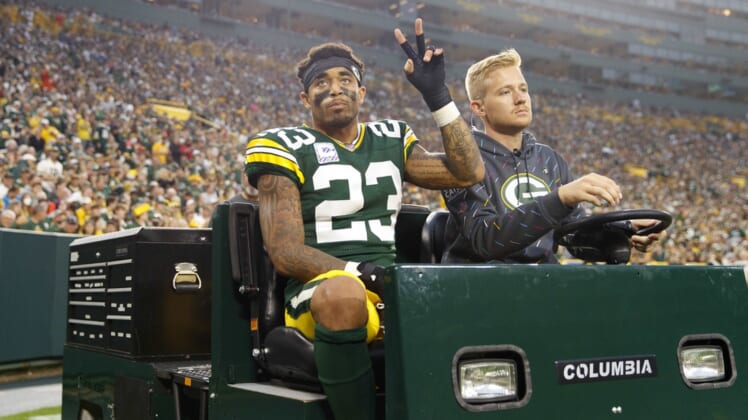 Oct 3, 2021; Green Bay, Wisconsin, USA;  Green Bay Packers cornerback Jaire Alexander (23) is driven from the field after being injured during the third quarter against the Pittsburgh Steelers at Lambeau Field. Mandatory Credit: Jeff Hanisch-USA TODAY Sports