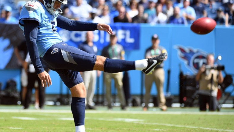 Sep 26, 2021; Nashville, Tennessee, USA; Tennessee Titans punter Brett Kern (6) punts the ball during the first half against the Indianapolis Colts at Nissan Stadium. Mandatory Credit: Christopher Hanewinckel-USA TODAY Sports