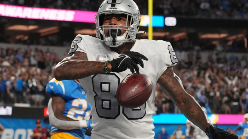 Oct 4, 2021; Inglewood, California, USA; Las Vegas Raiders tight end Darren Waller (83) celebrates after catching a pass for a touchdown against the Los Angeles Chargers during the second half at SoFi Stadium. Mandatory Credit: Kirby Lee-USA TODAY Sports