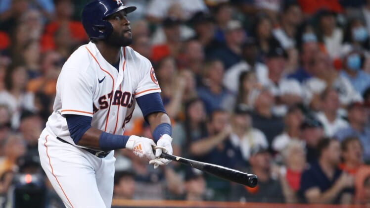 Oct 7, 2021; Houston, Texas, USA; Houston Astros designated hitter Yordan Alvarez (44) hits a solo home run against the Chicago White Sox during the fifth inning in game one of the 2021 ALDS at Minute Maid Park. Mandatory Credit: Troy Taormina-USA TODAY Sports