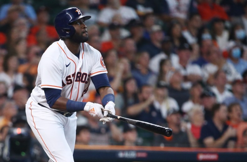 Oct 7, 2021; Houston, Texas, USA; Houston Astros designated hitter Yordan Alvarez (44) hits a solo home run against the Chicago White Sox during the fifth inning in game one of the 2021 ALDS at Minute Maid Park. Mandatory Credit: Troy Taormina-USA TODAY Sports