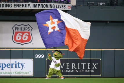 Oct 7, 2021; Houston, Texas, USA; Houston Astros mascot waves a flag after the Astros beat the Chicago White Sox in game one of the 2021 ALDS at Minute Maid Park. Mandatory Credit: Troy Taormina-USA TODAY Sports