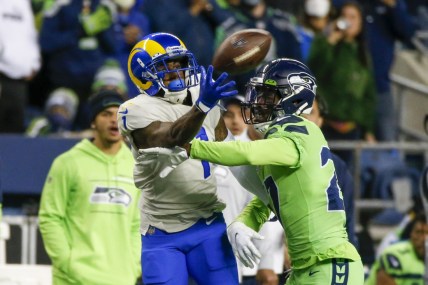 Oct 7, 2021; Seattle, Washington, USA; Seattle Seahawks defensive back Marquise Blair (27) breaks up a pass intended for Los Angeles Rams wide receiver DeSean Jackson (1) during the fourth quarter at Lumen Field. Mandatory Credit: Joe Nicholson-USA TODAY Sports