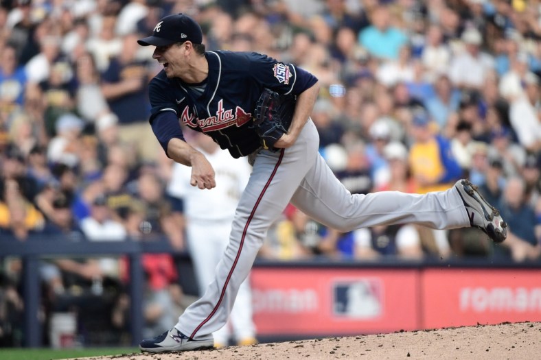 Oct 8, 2021; Milwaukee, Wisconsin, USA; Atlanta Braves starting pitcher Charlie Morton (50) pitches in the second inning against the Milwaukee Brewers during game one of the 2021 NLDS at American Family Field. Mandatory Credit: Benny Sieu-USA TODAY Sports