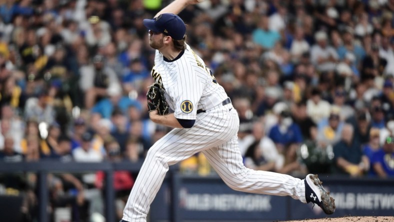 Oct 8, 2021; Milwaukee, Wisconsin, USA; Milwaukee Brewers starting pitcher Corbin Burnes (39) pitches in the fourth inning against the Atlanta Braves during game one of the 2021 NLDS at American Family Field. Mandatory Credit: Benny Sieu-USA TODAY Sports