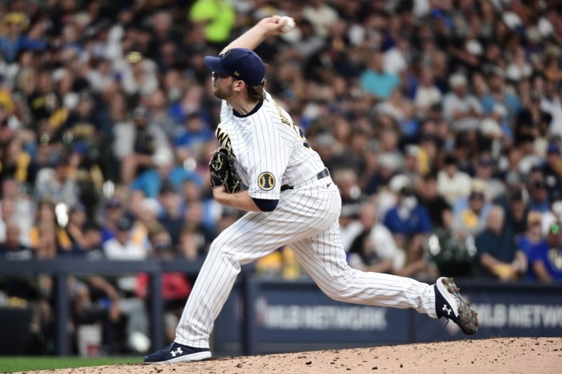 Oct 8, 2021; Milwaukee, Wisconsin, USA; Milwaukee Brewers starting pitcher Corbin Burnes (39) pitches in the fourth inning against the Atlanta Braves during game one of the 2021 NLDS at American Family Field. Mandatory Credit: Benny Sieu-USA TODAY Sports