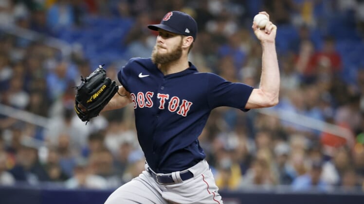 Oct 8, 2021; St. Petersburg, Florida, USA; Boston Red Sox starting pitcher Chris Sale (41) pitches against the Tampa Bay Rays during the first inning in game two of the 2021 ALDS at Tropicana Field. Mandatory Credit: Kim Klement-USA TODAY Sports