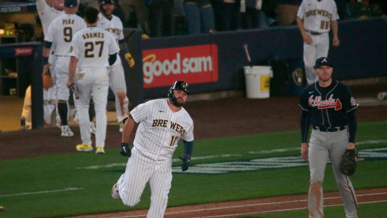 Milwaukee Brewers first baseman Rowdy Tellez (11) rounds first after hitting a two-run homer during the seventh inning of their National League Division Series game against the Atlanta Braves Friday, October 8, 2021 at American Family Field in Milwaukee, Wis.MARK HOFFMAN/MILWAUKEE JOURNAL SENTINEL

Mjs Brewers09 12 Jpg Brewers09