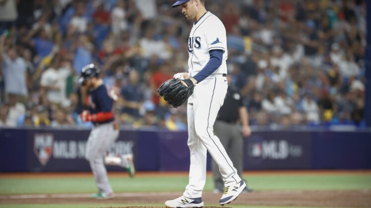 Oct 8, 2021; St. Petersburg, Florida, USA; Tampa Bay Rays relief pitcher Collin McHugh (31) reacts to giving up a home run to Boston Red Sox left fielder Alex Verdugo (99) during the third inning in game two of the 2021 ALDS at Tropicana Field. Mandatory Credit: Kim Klement-USA TODAY Sports