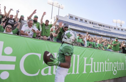 Oct 9, 2021; Huntington, West Virginia, USA; Marshall Thundering Herd wide receiver Shadeed Ahmed (0) celebrates with fans after catching a touchdown pass during the first overtime against the Old Dominion Monarchs at Joan C. Edwards Stadium. Mandatory Credit: Ben Queen-USA TODAY Sports
