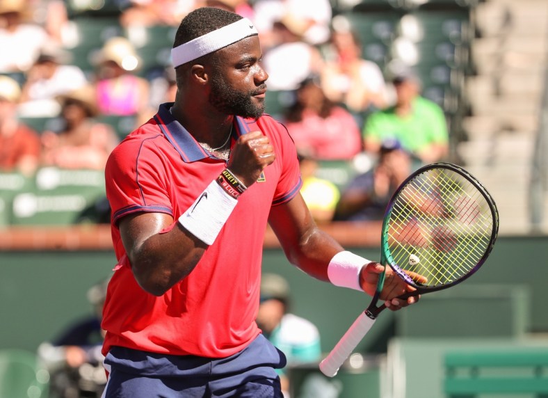 Frances Tiafoe celebrates a point win during his match against Sebastian Korda at the BNP Paribas Open in Indian Wells, October 9, 2021.

Bnp Saturday 24