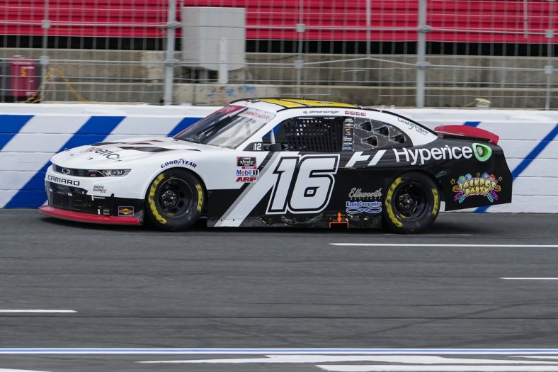 Oct 9, 2021; Concord, NC, USA; NASCAR Xfinity Series driver AJ Allmendinger (16) increases his lead during the Drive for the Cure 250 at Charlotte Motor Speedway. Mandatory Credit: Jim Dedmon-USA TODAY Sports
