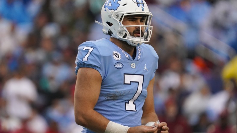 Oct 9, 2021; Chapel Hill, North Carolina, USA;  North Carolina Tar Heels quarterback Sam Howell (7) looks on during the game agains the Florida State Seminoles at Kenan Memorial Stadium. Mandatory Credit: James Guillory-USA TODAY Sports