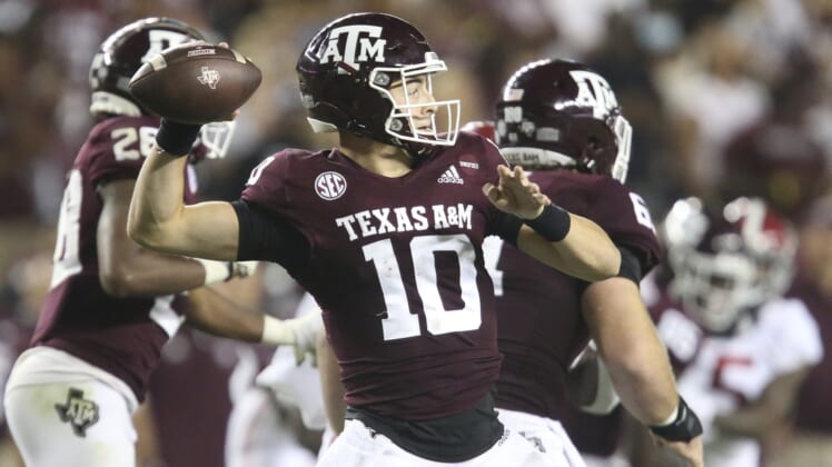 Oct 9, 2021; College Station, Texas, USA;  Texas A&M quarterback Zach Calzada (10) throws a pass against Alabama at Kyle Field. Texas A&M defeated Alabama 41-38 on a field goal as time expired. Mandatory Credit: Gary Cosby Jr.-USA TODAY Sports
