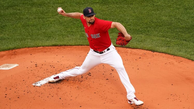 Oct 10, 2021; Boston, Massachusetts, USA; Boston Red Sox starting pitcher Nathan Eovaldi (17) pitches against the Tampa Bay Rays during the first inning in game three of the 2021 ALDS at Fenway Park. Mandatory Credit: David Butler II-USA TODAY Sports