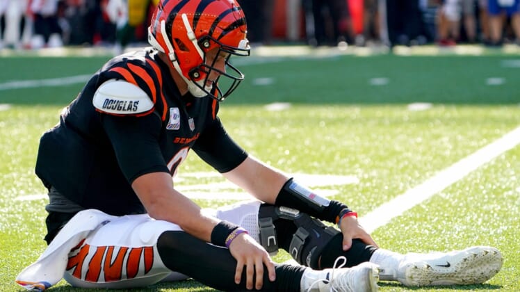 Cincinnati Bengals quarterback Joe Burrow (9) reacts after throwing an interception in overtime of a Week 5 NFL football game against the Green Bay Packers, Sunday, Oct. 10, 2021, at Paul Brown Stadium in Cincinnati. The Green Bay Packers won, 25-22.Green Bay Packers At Cincinnati Bengals Oct 10