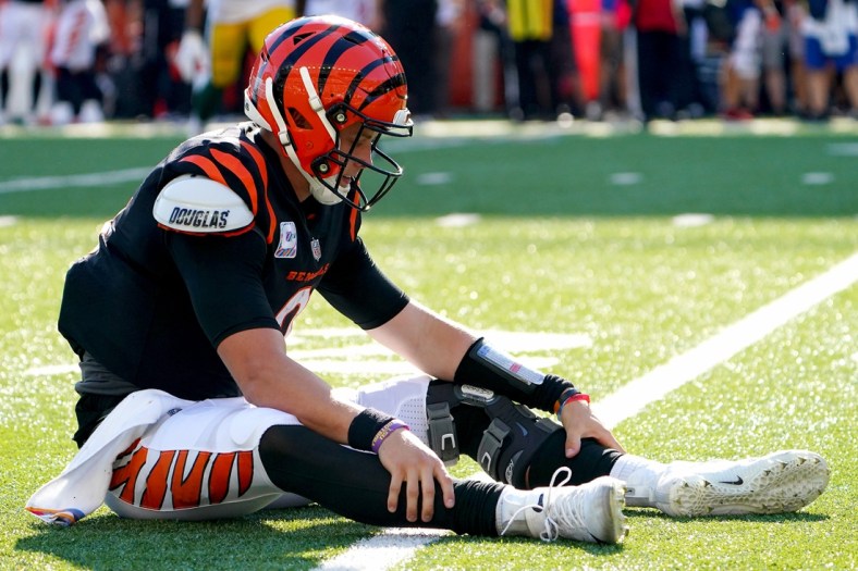 Cincinnati Bengals quarterback Joe Burrow (9) reacts after throwing an interception in overtime of a Week 5 NFL football game against the Green Bay Packers, Sunday, Oct. 10, 2021, at Paul Brown Stadium in Cincinnati. The Green Bay Packers won, 25-22.

Green Bay Packers At Cincinnati Bengals Oct 10