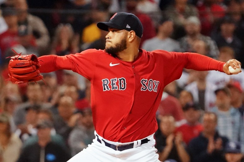 Oct 11, 2021; Boston, Massachusetts, USA; Boston Red Sox starting pitcher Eduardo Rodriguez (57) pitches against the Tampa Bay Rays during the first inning during game four of the 2021 ALDS at Fenway Park. Mandatory Credit: David Butler II-USA TODAY Sports