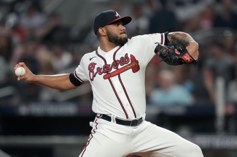 Oct 12, 2021; Cumberland, Georgia, USA; Atlanta Braves starting pitcher Huascar Ynoa (19) throws a pitch against the Milwaukee Brewersduring the fifth inning in game four of the 2021 ALDS at Truist Park. Mandatory Credit: Dale Zanine-USA TODAY Sports