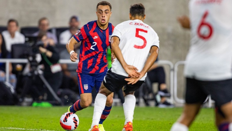 Oct 13, 2021; Columbus, Ohio, USA; the United States defender Sergino Dest (2) dribbles the ball while Costa Rica midfielder Celso Borges (5) defends  during a FIFA World Cup Qualifier soccer match at Lower.com Field. Mandatory Credit: Trevor Ruszkowski-USA TODAY Sports