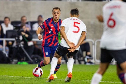 Oct 13, 2021; Columbus, Ohio, USA; the United States defender Sergino Dest (2) dribbles the ball while Costa Rica midfielder Celso Borges (5) defends  during a FIFA World Cup Qualifier soccer match at Lower.com Field. Mandatory Credit: Trevor Ruszkowski-USA TODAY Sports