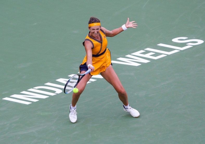 Victoria Azarenka of Belarus returns to Jessica Pegula of the United States during their quarterfinal match of the BNP Paribas Open, Wednesday, Oct. 13, 2021, in Indian Wells, Calif.