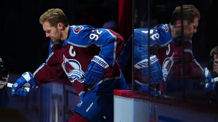Oct 13, 2021; Denver, Colorado, USA; Colorado Avalanche left wing Gabriel Landeskog (92) before the game against the Chicago Blackhawks at Ball Arena. Mandatory Credit: Ron Chenoy-USA TODAY Sports