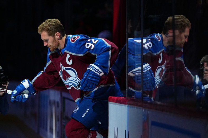 Oct 13, 2021; Denver, Colorado, USA; Colorado Avalanche left wing Gabriel Landeskog (92) before the game against the Chicago Blackhawks at Ball Arena. Mandatory Credit: Ron Chenoy-USA TODAY Sports