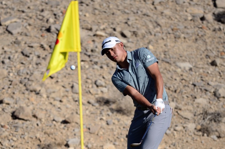 Oct 14, 2021; Las Vegas, Nevada, USA; Collin Morikawa chips on the second fringe during the first round of the CJ Cup golf tournament. Mandatory Credit: Joe Camporeale-USA TODAY Sports