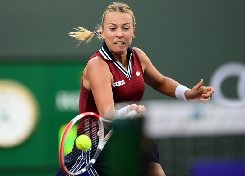 Oct 14, 2021; Indian Wells, CA, USA; Anett Kontaveit (EST) hits a shot against Ons Jabeur (TUN) in their quarterfinal match during the BNP Paribas Open at the Indian Wells Tennis Garden. Mandatory Credit: Jayne Kamin-Oncea-USA TODAY Sports