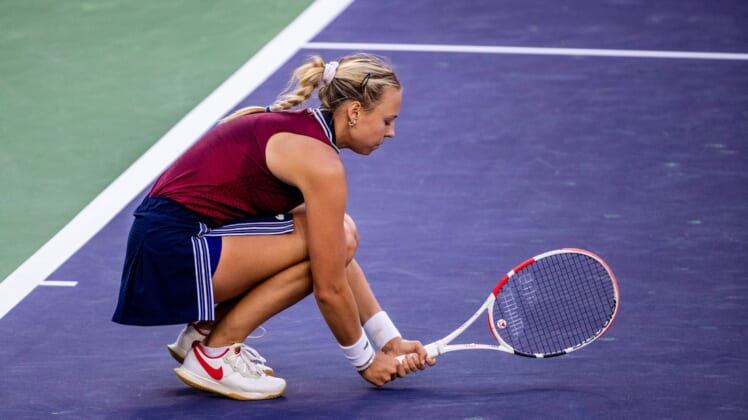 Anett Kontaveit of Estonia reacts during her loss to Ons Jabeur of Tunisia in their quarterfinal match at the BNP Paribas Open in Indian Wells, Calif., on October 14, 2021.Ons Jabeur Def Anett Kontaveit Bnp Paribas2148