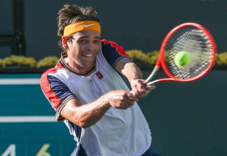 Taylor Fritz hits a shot against Alexander Zverev during their quarterfinal match at the BNP Paribas Open in Indian Wells, October 15, 2021.

Bnp Friday 22
