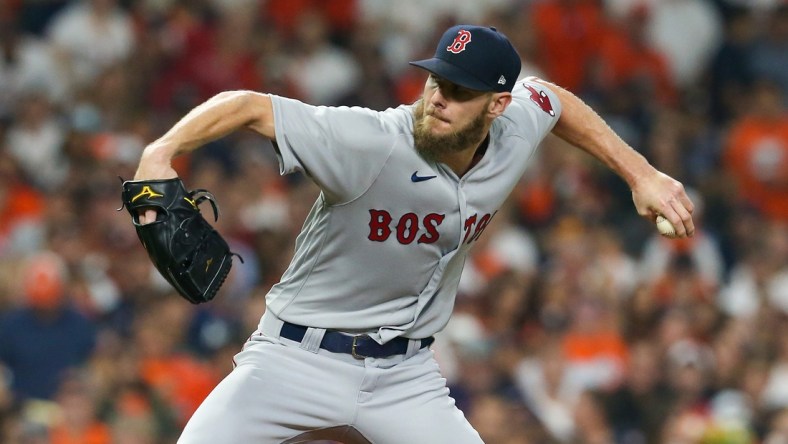 Oct 15, 2021; Houston, Texas, USA; Boston Red Sox starting pitcher Chris Sale (41) pitches against the Houston Astros during the first inning in game one of the 2021 ALCS at Minute Maid Park. Mandatory Credit: Thomas Shea-USA TODAY Sports