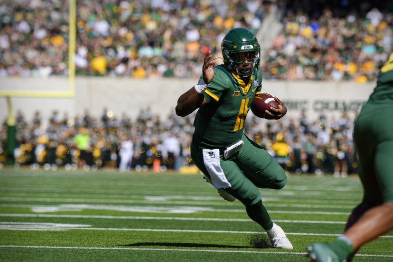 Oct 9, 2021; Waco, Texas, USA; Baylor Bears quarterback Gerry Bohanon (11) in action during the game between the Baylor Bears and the West Virginia Mountaineers at McLane Stadium. Mandatory Credit: Jerome Miron-USA TODAY Sports