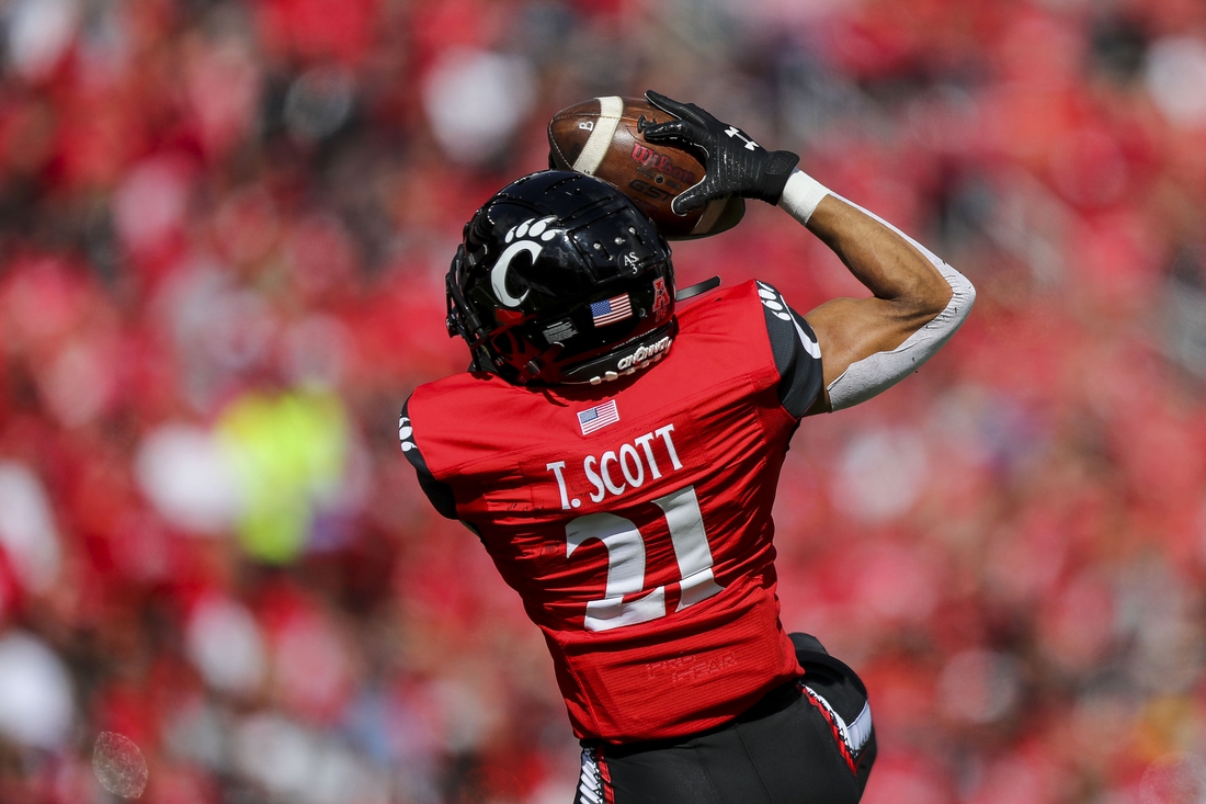 Oct 16, 2021; Cincinnati, Ohio, USA; Cincinnati Bearcats wide receiver Tyler Scott (21) catches a pass against the UCF Knights in the first half at Nippert Stadium. Mandatory Credit: Katie Stratman-USA TODAY Sports