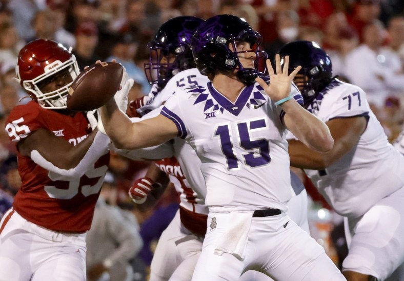 Oct 16, 2021; Norman, Oklahoma, USA; TCU Horned Frogs quarterback Max Duggan (15) throws during the first quarter against the Oklahoma Sooners at Gaylord Family-Oklahoma Memorial Stadium. Mandatory Credit: Kevin Jairaj-USA TODAY Sports