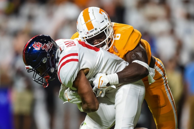 Oct 16, 2021; Knoxville, Tennessee, USA; Tennessee Volunteers linebacker Byron Young (6) tackles Mississippi Rebels running back Jerrion Ealy (9) during the first half at Neyland Stadium. Mandatory Credit: Bryan Lynn-USA TODAY Sports