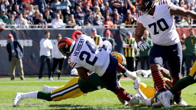 Oct 17, 2021; Chicago, IL, USA;  Chicago Bears running back Khalil Herbert (24) scores a touchdown during the first quarter of their game against the Green Bay Packers at Soldier Field in Chicago on Sunday, Oct. 17, 2021. Mandatory Credit: Mike De Sisti-USA TODAY Sports