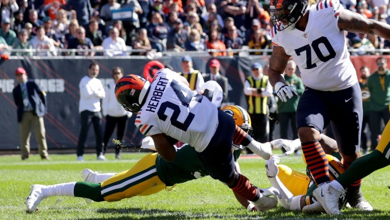 Oct 17, 2021; Chicago, IL, USA;  Chicago Bears running back Khalil Herbert (24) scores a touchdown during the first quarter of their game against the Green Bay Packers at Soldier Field in Chicago on Sunday, Oct. 17, 2021. Mandatory Credit: Mike De Sisti-USA TODAY Sports