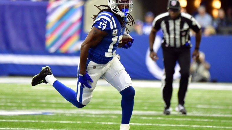 Oct 17, 2021; Indianapolis, Indiana, USA; Indianapolis Colts wide receiver T.Y. Hilton (13) runs the ball during the second half against the Houston Texans at Lucas Oil Stadium. The Colts win 31-3.  Mandatory Credit: Marc Lebryk-USA TODAY Sports