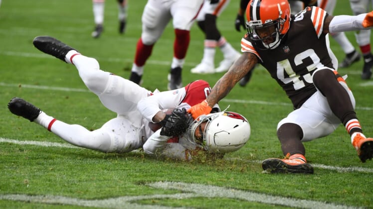 Oct 17, 2021; Cleveland, Ohio, USA; Arizona Cardinals wide receiver DeAndre Hopkins (10) catches a touchdown pass as Cleveland Browns free safety John Johnson (43) defends during the first half at FirstEnergy Stadium. Mandatory Credit: Ken Blaze-USA TODAY Sports (NFL News)
